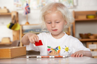 stock-photo-20361863-young-girl-playing-at-montessori-pre-school